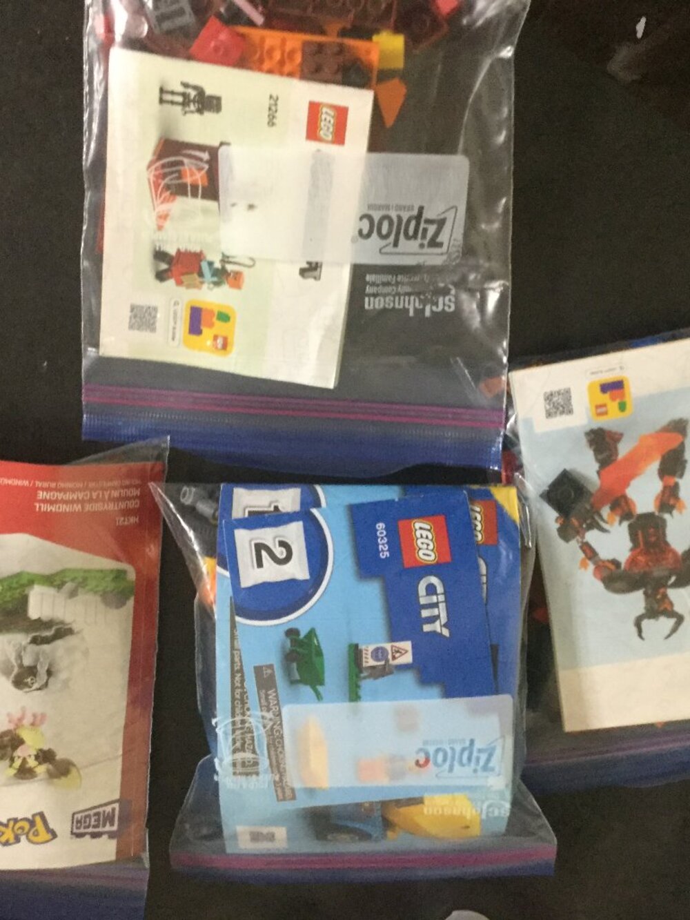 Lego 4 sets all pieces for each is accounted for the manuals are there no boxes